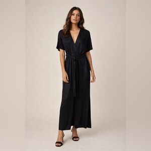 FRNCH Alex black metallic jumpsuit with a tie waist and faux wrap V-neck S